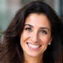 Photo of Mariam Salem, a smiling woman looking engaged.